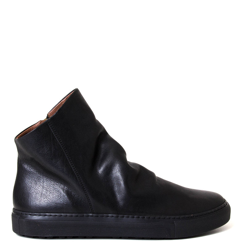 Black leather ankle boot on a white background
