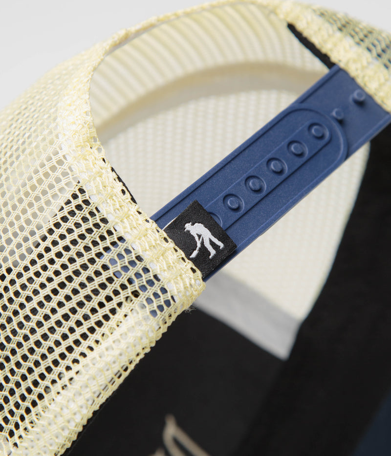 Pass Port Towers Of Water Workers Trucker Cap in Navy and Cream