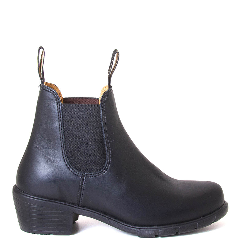 Blundstone Women's 16371 Chelsea Boot  in Black. Built to last. Perfect of everyday wear. Durable material, with comfortable shock absorption insole. Rubber sole. Side view.