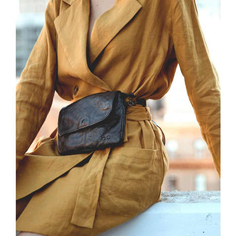 Bed Stu Ziggy. Women's crossbody, shoulder handbag in Black leather. Worn view, with leather strap.